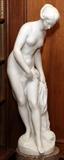 Lot#1008, AFTER FALCONET, CARVED MARBLE SCULPTURE, H 32", W 9", STANDING BATHER,Carved in Italy. A standing bather. Carved in a single sculpture from white Carrera marble.