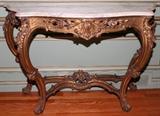 Lot#1037, LOUIS XV STYLE GILT WOOD CONSOLE WITH MARBLE TOP, 19TH C., H 34 1/2", W 50", D 17"Serpentine top above a pierced frieze, raised on cabriole legs joined by a stretcher.