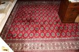 Lot#1062, BOKHARA ORIENTAL RUG, 11' 10" X 9' 6"Red ground, overall medallion pattern. Hand woven. Circa 1960. All wool.