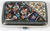 Lot#1096, RUSSIAN SILVER & ENAMEL CIGARETTE CASE, C. 1896-1908, L 3 3/4"The hinged sides decorated with brightly colored foliate scroll enamels, stamped with Kokoshnik indicating .875 fineness, and assayer's mark, possibly Nikolai Alekseyev (see additional photo).  Measures L.3 3/4" x 2 5/8".