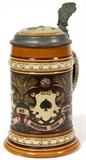 Lot#1115, METTLACH ETCHED STEIN, #1395, C. 1910, H 7.5", SUITE OF CARDS.Etched 1/2 L. Suites of Cards. Inlay lid. H 7.5". Pug style.