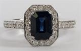 Lot#1131, 14KT WHITE GOLD, 1.64CT NATURAL SAPPHIRE & DIAMOND RING, 4.6GR.Featuring a 1.64 carat natural sapphire at center, surrounded by 1.00 carats of side diamonds along the setting and band, with a G-color, VS-2 clarity grading. The total weight of the ring is approximately 4.6 grams. Size 5.25-5.5.
