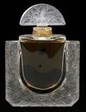 Lot#1234, LALIQUE GLASS PERFUME BOTTLE, H 4", W 3", BOXED WITH PENDANT,The l'Eau de Parfum factice in original case with pendant.   Box H.6 1/2" x 5".