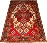 Lot#1302, HAMADAN PERSIAN HAND-WOVEN RUG, 6' 5" X 4' 4"Having an ivory field, with a red central medallion and canted corners. Floral motif decoration.