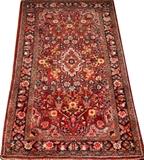 Lot#1303, HAMADAN PERSIAN HAND-WOVEN RUG, 5' 7" X 3' 4"Sarouk style. Having a red field, decorated with an all over floral motif.