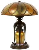 Lot#2050, TIFFANY STUDIOS FAVRILE GLASS TABLE LAMP, H 15'' DIA 12"TIFFANY STUDIOS FAVRILE GLASS TABLE LAMP, H 15'' DIA 12"Lamp having lower globe and shade. Lower globe signed, shade is stamped, base stamped and numbered # 10752.