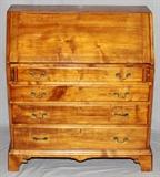 Lot#2171, CHIPPENDALE STYLE MAHOGANY & FIGURED MAHOGANY DROP SLANT FRONT DESK, 19TH C., H 40", W 36", D 19"4 drawers graded in size having willow brasses; scalloped bracket feet and apron.  Dovetail and dowel joinery
