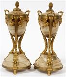 Lot#2323,BRONZE & ONYX, CANDLESTICKS & CASOLETTES, PAIR, H 10" W 4"Onyx casolettes that convert into candlesticks. Raised on three feet, having gilt bronze mounts, decorated in leaf, floral, and harp motif, with berry finials. Measure H. 10" x 4".