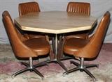 Lot#2408, CHROMECRAFT, MID-CENTURY MODERN, DINETTE SET, 5 PCS., H 30", DIA 45"having an octagonal table, 30" H. x 45" Dia. with a light grain Formica top with chrome and teak pedestal base. Four swivel base chairs with light brown vinyl cushions with fluted backrests.