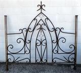 wrought iron panel turned into headboard