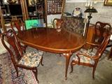 oval dining table with six chairs