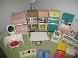 found a whole box of vintage Barbie dolls and doll furniture. check out the kitchen pieces!