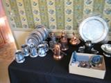Lots of pewter and silverplate including Williamsburg and Wilton