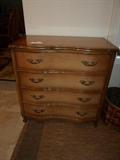 cute little serpentine front 4 drawer chest