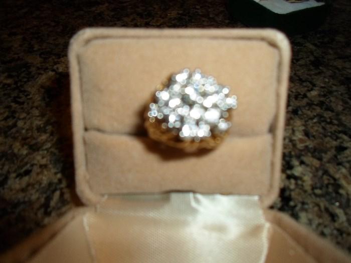 not a good shot of this 18K diamond cluster ring. 1.40 CTW, have recent appraisal on this piece