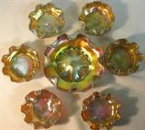 Tiffany 7-pc. salt set in gold Favrile