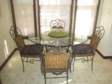 Glass Top Table with Iron Base and 4 Iron chairs