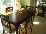 Retrospect Dining Table with 4 Chairs with End Extenders
Handcrafted Seats - Cream Colored Chair Pads and Back Slip Covers
