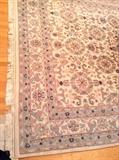 One of a matching pair of 8 x 10 ft. wool rugs.  Both are in GREAT condition!