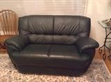 5 ft. very dark green leather loveseat - made in Italy