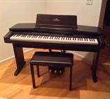 Yamaha Clavinova electric piano - Model CVP-87A.  Cost $5800 new in 1995.  Our price $850.  Includes manual & music disks.