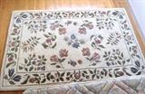 Hand tufted 62" x 93" wool rug from India.  Thick pile - includes pad.