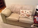 One of 4 sofas we have for sale - this one is 7 1/2 ft. long tan leather