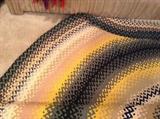 Detail of 9 ft. round braided rug - in GREAT condition!  Colors are greens, yellow, tan & taupe.