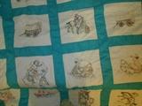 Old quilt with western scenes