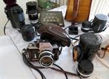 Several Nikon and Vivitar lenses. Nikon 35mm camera