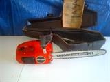 Craftsman 2.0/14" gas-powered chain saw, in excellent condition, includes a hard-shell case.