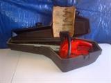 Craftsman 2.0/14" gas-powered chain saw, in excellent condition, includes a hard-shell case.