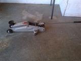 Hydraulic jack, 3,000-lb capacity.