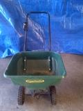 Green Thumbs lawn spreader. Spring will be here before you know it!