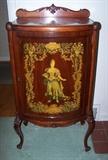 Mahogany Music Cabinet. This piece was converted to a liquor cabinet, and has damage to the front left leg that should be professionally repaired.
