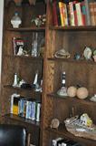 solid wood bookshelves, dvds, vhs tapes, decor