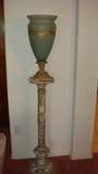 Greecian urn on marble stand