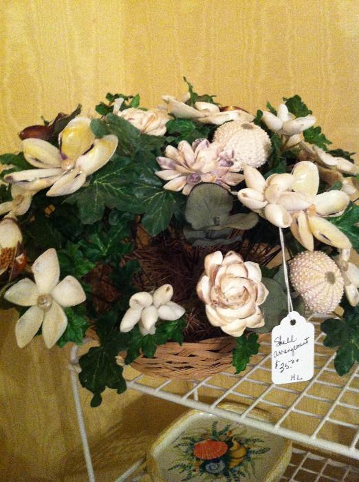                floral arrangement made from shells
