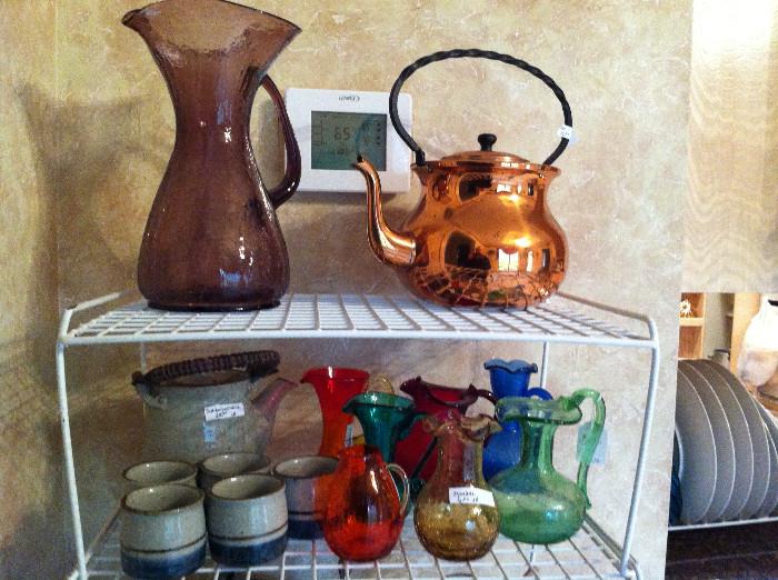                     copper kettle; colorful glassware