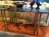                             oblong glass top/brass sofa table