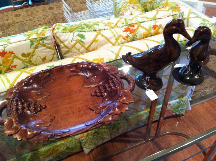             wooden bowl with grapes; carved ducks