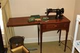Vintage Singer - Model 15-91 Heavy Duty Machine with original instruction book and attachments.