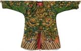 Lot#1007, CHINESE EMBROIDERED GREEN SILK DRAGON ROBE, LATE 19TH-EARLY 20TH C.,Emerald green ground featuring three dragons at the front, three dragons at the back and one at each shoulder, each with four claws and chasing flaming pearls amidst multicolored stylized clouds; 40'' back vertical height, black silk trousers.