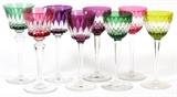 Lot#1082, BACCARAT CUT CRYSTAL WINE GLASSES, EIGHT, H 7 1/2" & 8"Includes four Rhine wine stems at 7 1/2", and four white wine stems at 8"; all decorated with color overlay. Stamped at undersides.