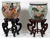 Lot#1177, CHINESE PORCELAIN COI BOWLS, TWO, H 11 1/2", DIA 12 1/2"Both signed at underside. Decorated in floral and leaf motif.  Both measuring H. 11 1/2", with a 12 1/2" diameter. Presented on wood stands. Circa 1960-70.