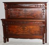 Lot#1249, CARVED MAHOGANY HIGH-BACK BED, C. 1900, H 60", W 60"Footboard, headboard, wood side rails and slats. Panel in headboard of burl wood.