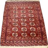 Lot#2080, BOKHARA WOOL RUG, 3' 7" X 5' 6"having a red ground, six borders, 21 octagonal medallions.