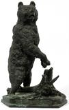 Lot#2149, IEVGUENI LANCERAY, RUSSIAN BRONZE, SCULPTURE OF A BEAR, H 22", W 10"A bear standing atop a naturalistic hexagonal base with tree trunk formation, signed in Cyrillic, bearing further Cyrillic inscriptions and dated 1865 (see additional photos).  Yevgeny Alexandrovich Lancerey, Russian, 1848-1886.
