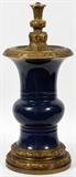 Lot#2296, NORTHERN EUROPEAN PORCELAIN & BRONZE PEDESTAL FORM TALL LAMP BASE, 19TH C., H 23" DIA 10"French or English; unmarked; midnight blue glazed.