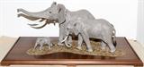 Lot#5, LOUIS PAUL JONAS STUDIOS GROUP OF ELEPHANTS, H 18", W 37", ENCASED,Hand-painted composite group of three elephants, measuring H.13" x 28" x 17", limited edition #47/100, dated 2/97 (see additional photo), on a wood base within an acrylic display case, H.18" x 37" x 24".